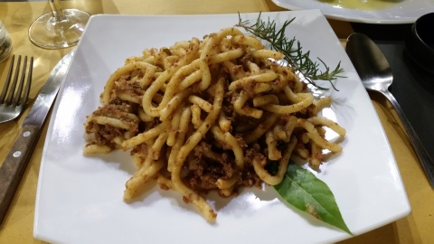 Pici (a local pasta) with boar sauce. This was very good and immobilizing.